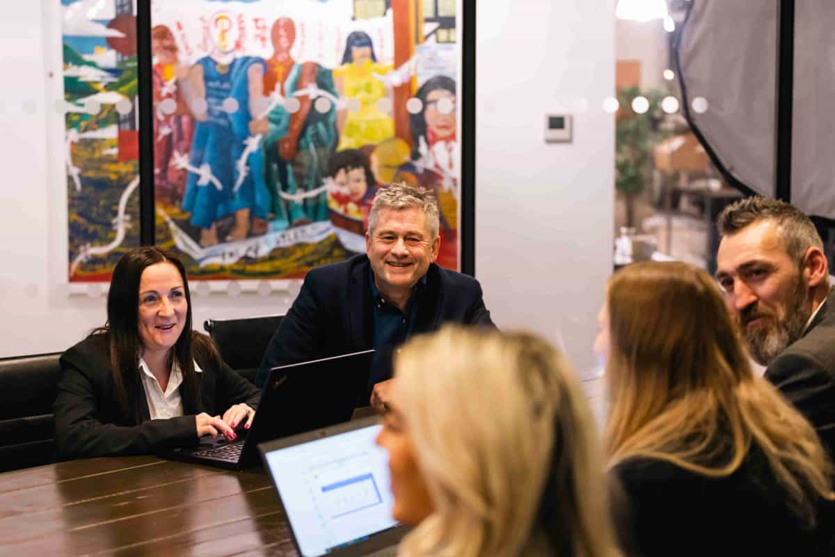 Adam attending a Boardroom Meeting at Vision One