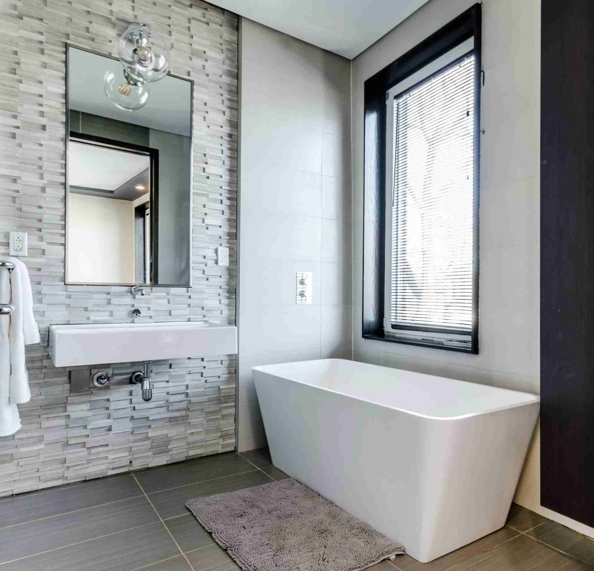 Bathroom with white bath and sink