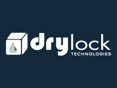 Drylock Technologies logo featuring a water droplet inside a cube with bold white text on a dark blue background.